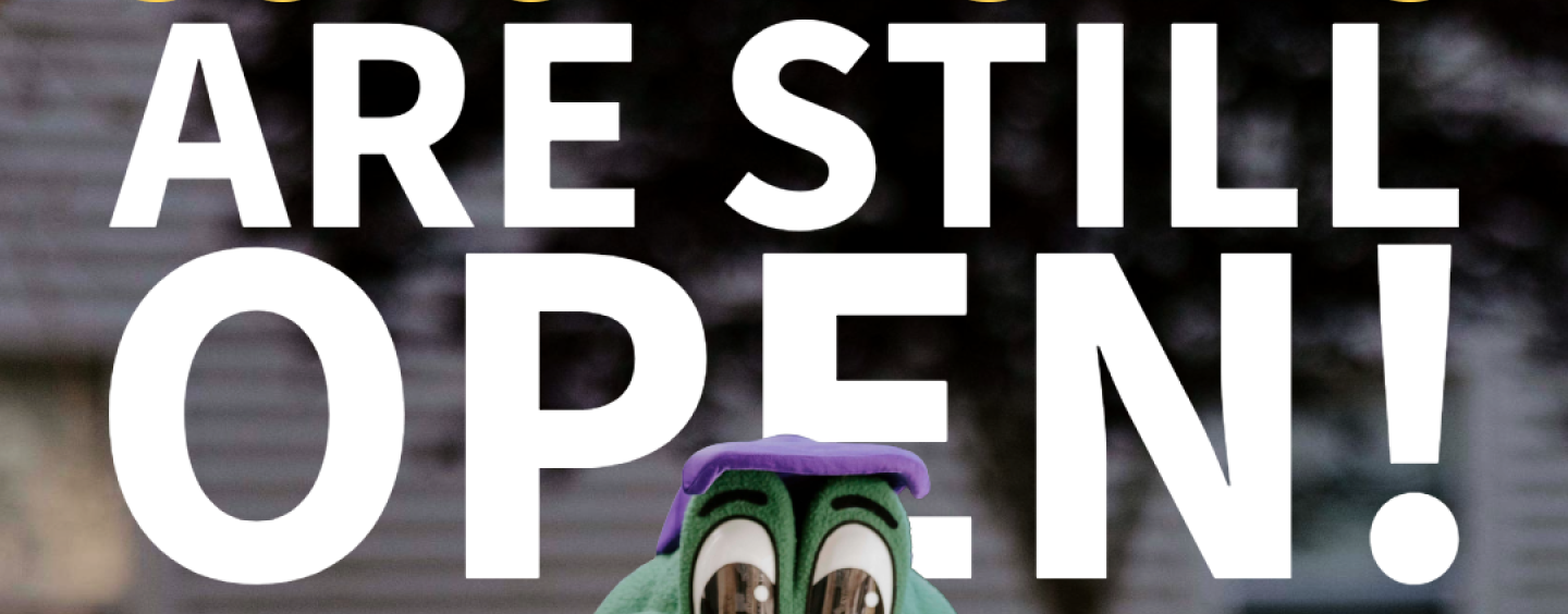 gator mascot looking surprised in front of text "English Department Scholarships are still open!"